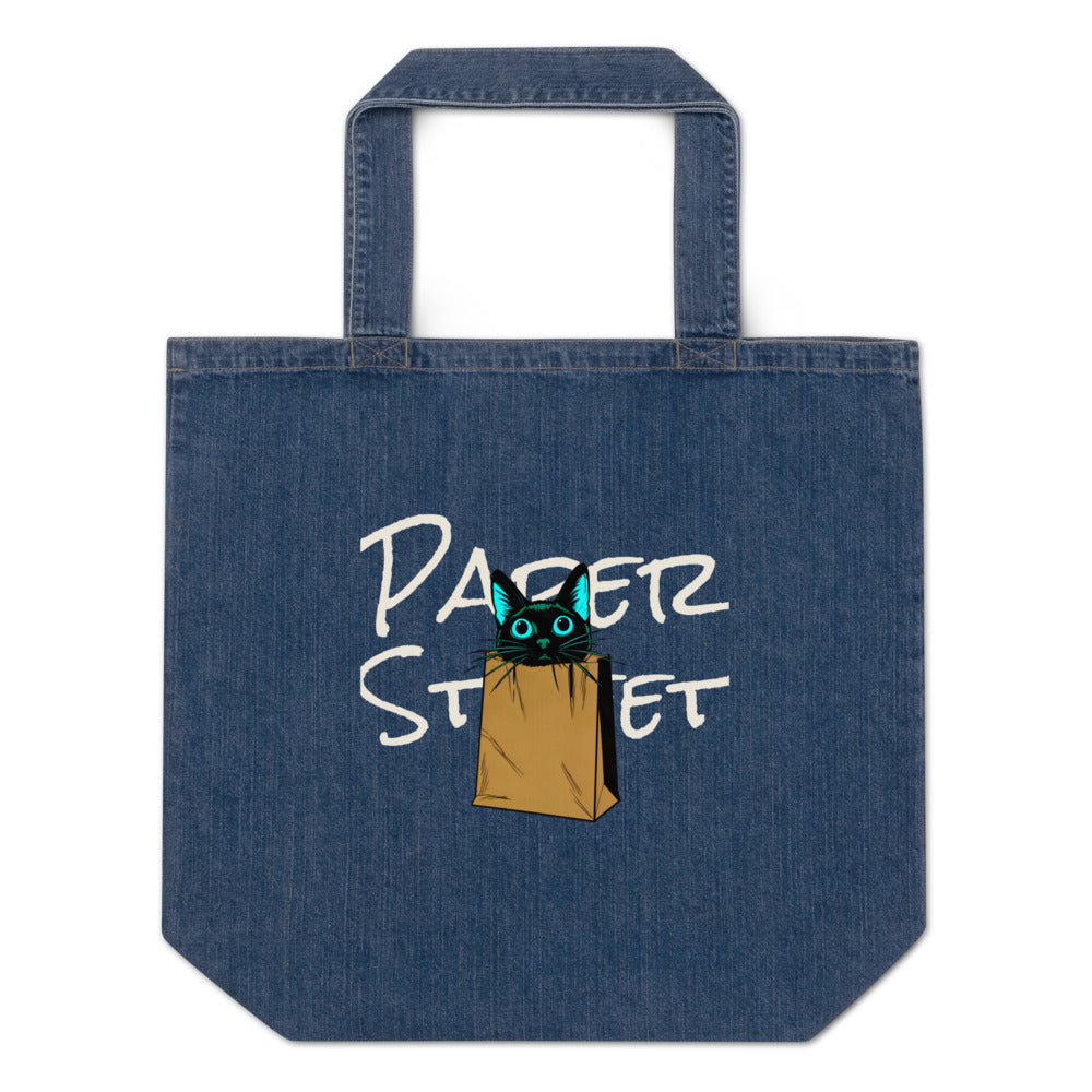 The Cat Who Chose the Bag — an original artwork printed on 305gsm organic cotton denim or 12oz cotton canvas — you choose the bag